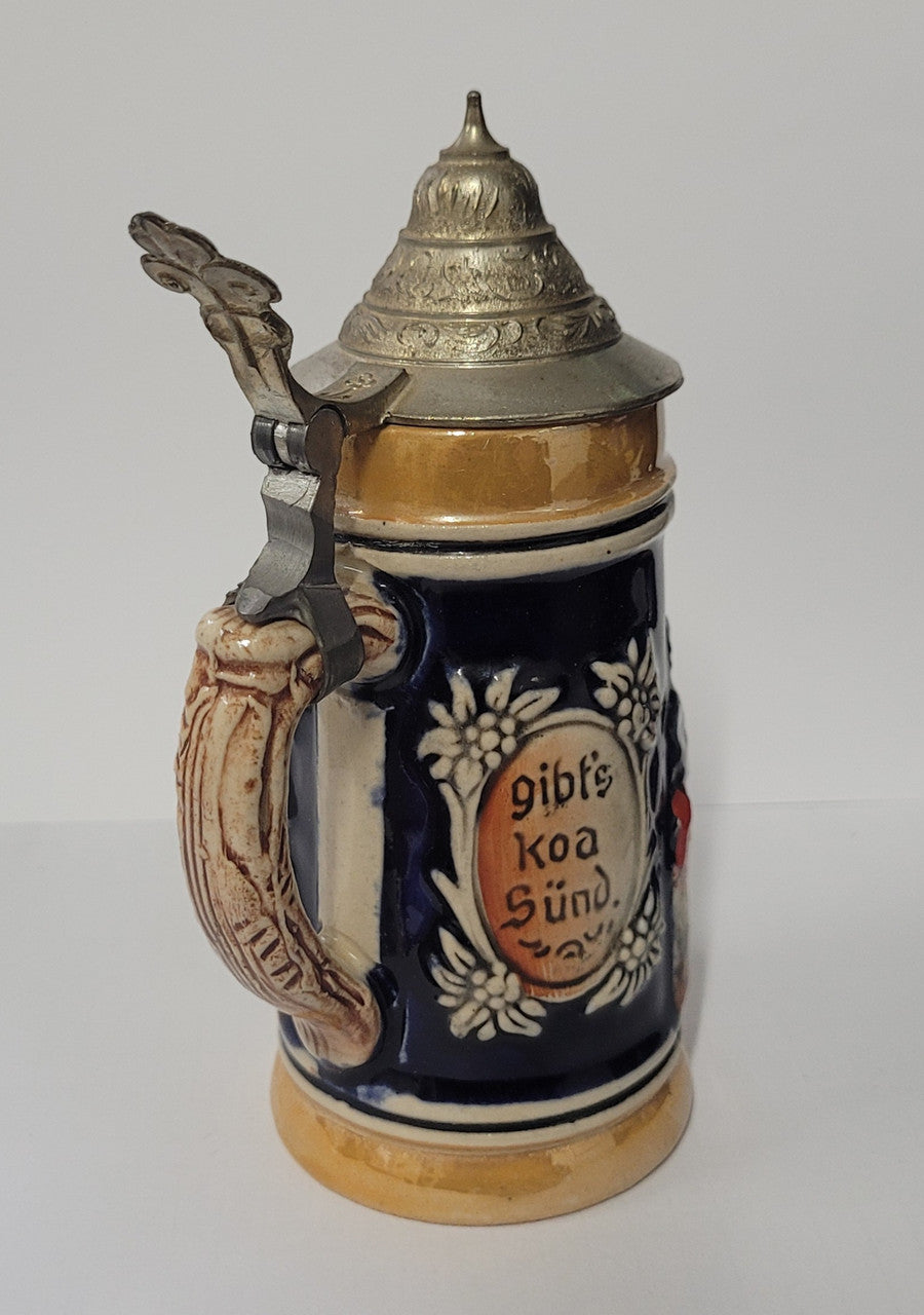 Small Vintage German beer stein marked made in the federal republic of Germany underneath. It is in good original condition, please view photos as they help form part of the description.