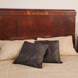 French Art Deco bedroom suite consisting of queen size bed in Amboyna wood and featuring pretty inlay. It comes with a matching pair of bedsides. It is a very stylish and high quality suite. It has been sourced from France and is in good original detailed condition.