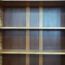 A beautiful Edwardian walnut stained bookcase with lovely carved doors and adjustable shelves. It is 227 cm tall and in very good fully restored condition.