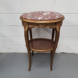 An exceptional & rare 18th century Louis XVI oval inset marble top & giltwood side table with original water gilding. In good restored condition. Circa 1790.