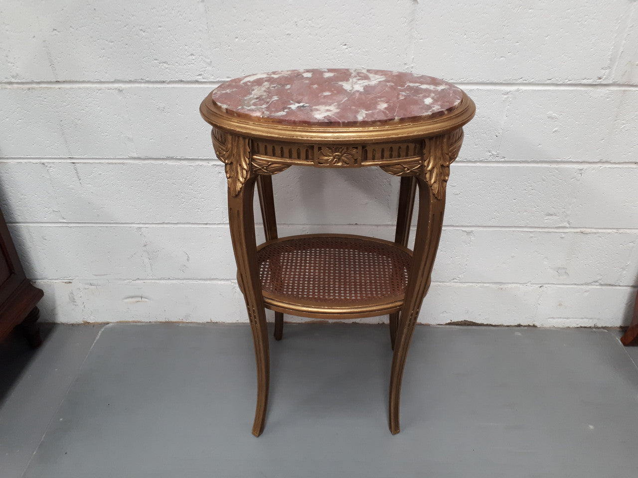 An exceptional & rare 18th century Louis XVI oval inset marble top & giltwood side table with original water gilding. In good restored condition. Circa 1790.
