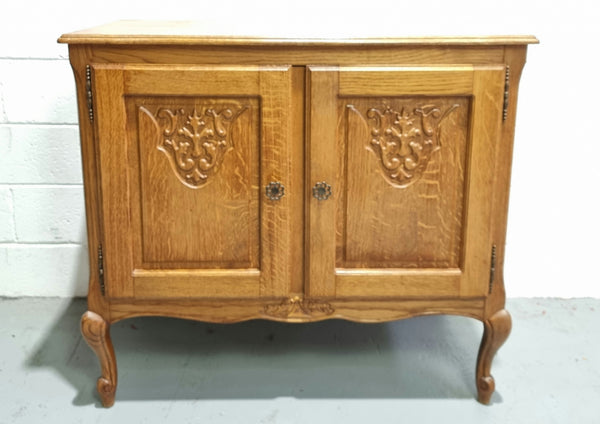 Vintage French Oak two door cabinet which would make an ideal TV cabinet or storage unit. In good original detailed condition.