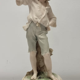 Lovely Italian figurine of boy carrying basket with grapes on a wooden base. It is signed Giuseppe Armani and 1982 FLORENCE. In good original condition.  Please view photos as they form part of the description.