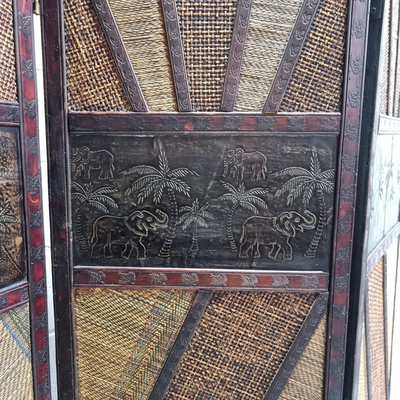 Vintage three panel room divider with elephants made from rattan and wood. It has been sourced locally and is in good original condition.