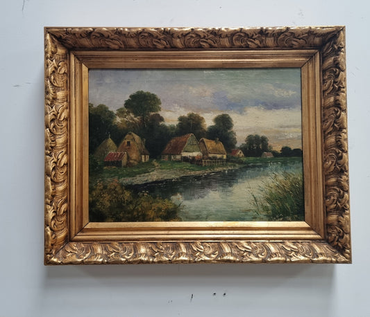 Lovely framed original oil on canvas of a country cottage scene on a river in good original condition