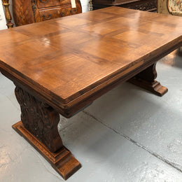 A beautiful French oak, Spanish style parquetry top extension table, with amazing carving and lovely details in very good condition.