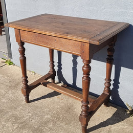 Rustic French Oak side table/desk with turned legs. In good original condition.