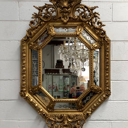 Early 19th Century gilt cushion mirror with acid etched floral pattern. In good condition. Please note original mirror does show some spotting commensurate with its age. Circa