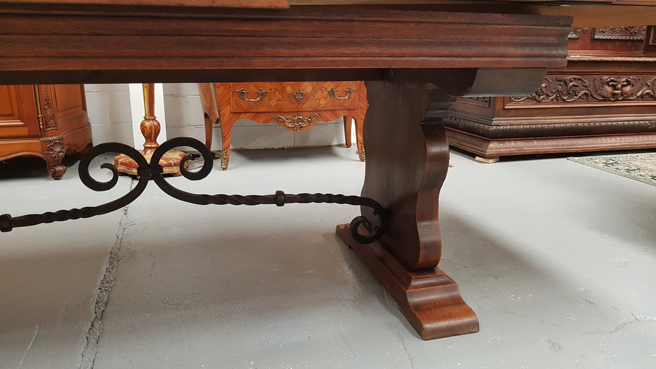 A beautiful French oak, Spanish style parquetry top extension table, with amazing carving and lovely details in very good condition.