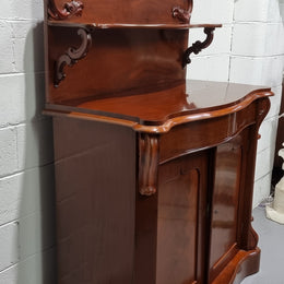 Beautiful Antique Victorian Mahogany two door Chiffonier. Plenty of storage space with one drawer and the two doors open up to a shelved area. It is in good restored condition.