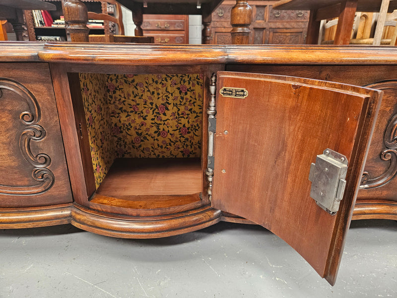 Appealing French Louis XVth style walnut converted TV unit.  Central carved  door & 2 Sliding Cupboards. In good condition.
