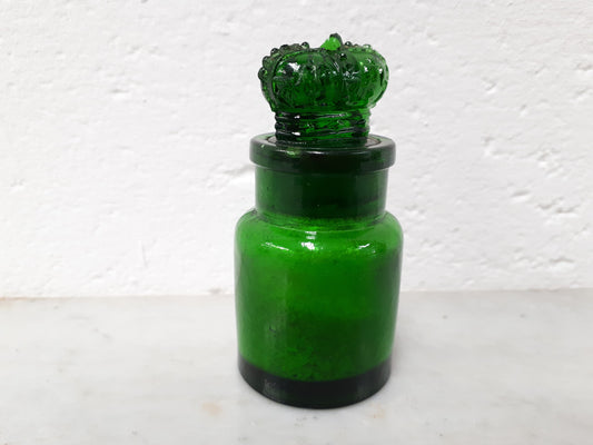 Round Victorian green glass Crown perfume bottle. In good original condition.