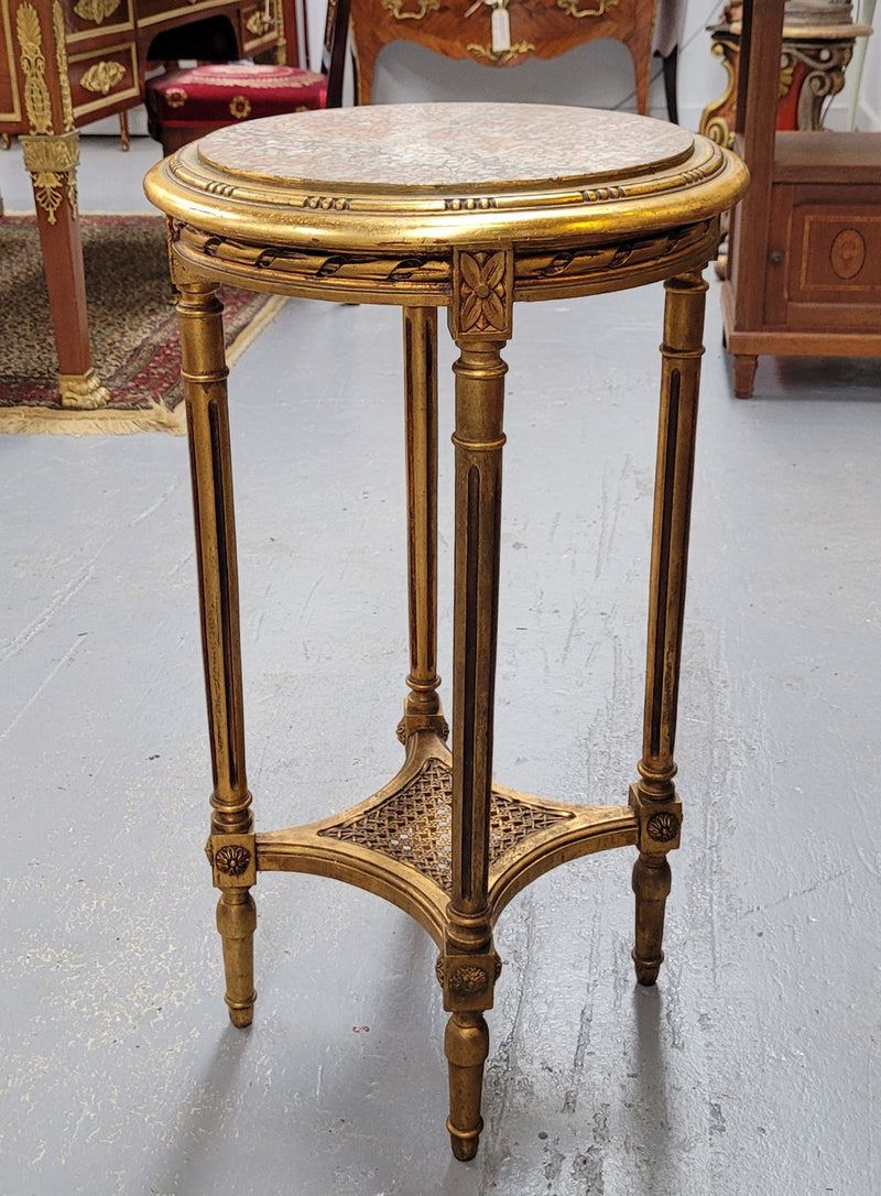 Late 19th Century French Louis XVI style round marble top side table/ lamp table. It is in good original detailed condition and has been sourced from France.