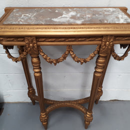 Antique French 19th century Louis XVI style inset marble top & giltwood console table. In good condition. Circa 1880
