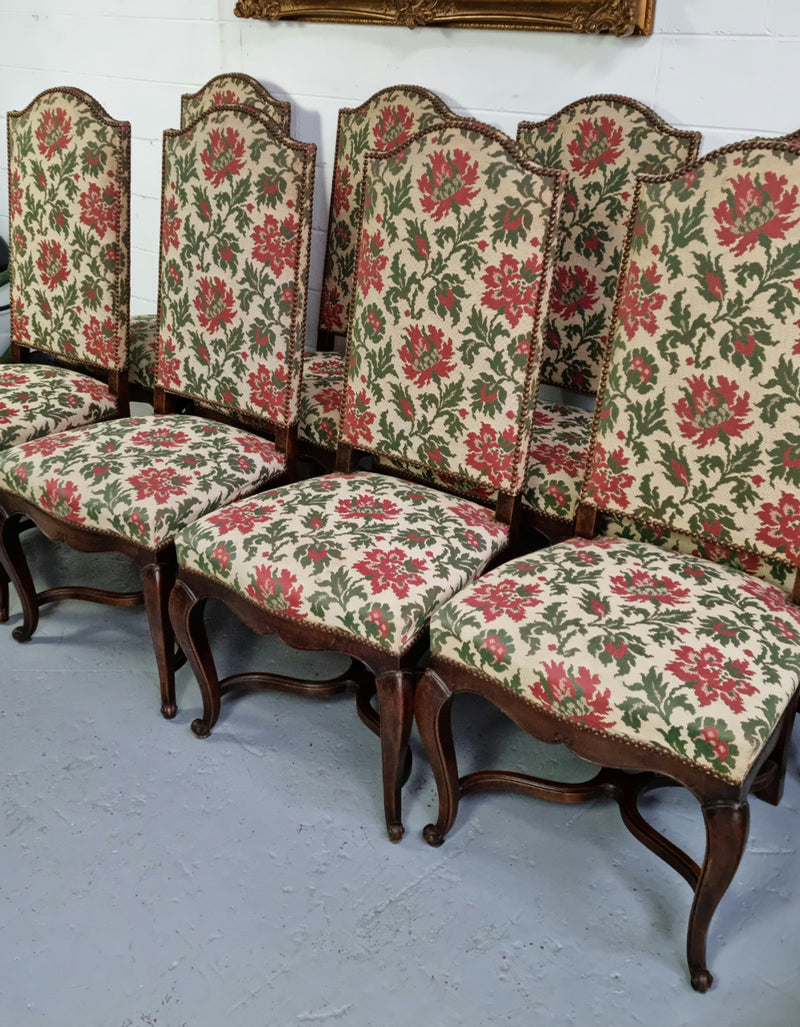 Rare set of eight high quality French walnut Louis XV style chairs. They have original tapestry ready to be reupholstered. Frames are in good strong condition.
