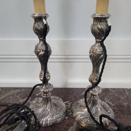 Pair of Antique French Silver candlestick table lamps with new wiring. In good original condition.