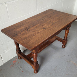 Small French Oak rustic coffee table. Perfect size for a small area and it is in good original detailed condition.