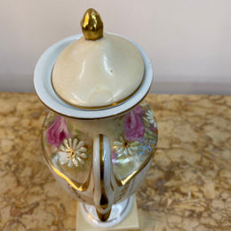 SIgned hand painted Portugal china lidded urn vase with swan handles.