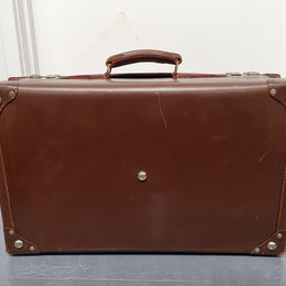 Impressive solid leather suitcase, moire fabric lined with leather straps to hold contents. Displays gold initials F.S.A near handle. With key. Please view photos as they help form part of the description.