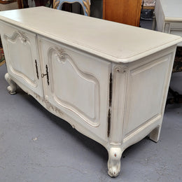Louis XV style chalk painted two door cabinet which would also make an ideal TV cabinet. It has been sourced from France and in good original detailed condition.