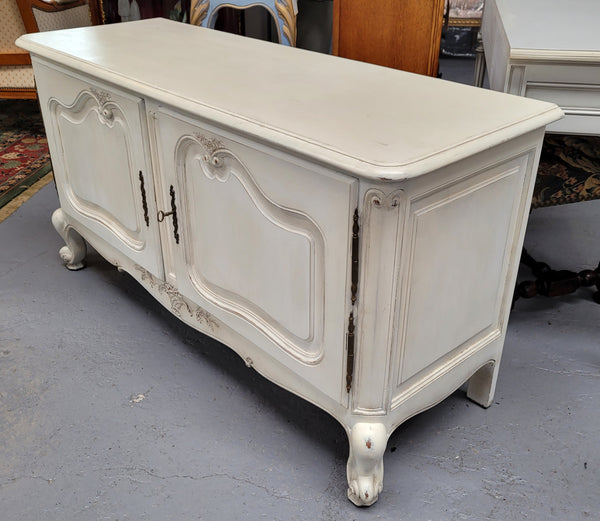 Louis XV style chalk painted two door cabinet which would also make an ideal TV cabinet. It has been sourced from France and in good original detailed condition.