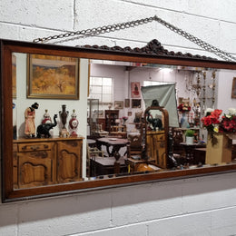 Attractive Edwardian rectangular wall mirror, with carved detail and beaded edge. Retaining it's original bevelled edge mirror and is in good original condition.