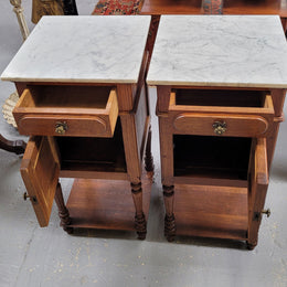 Antique French Oak Henry II white marble top bedside cabinets. They have one drawer and cupboard a long with an open shelf at the bottom. Sourced from France and in good original detailed condition.