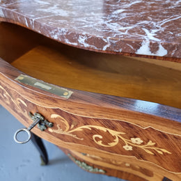 Lovely french 3 drawer Rosewood and Kingwood ,marquetry inlaid commode. There are 3 drawers and a lovely marble top with ormolu mounts in good original detailed condition.