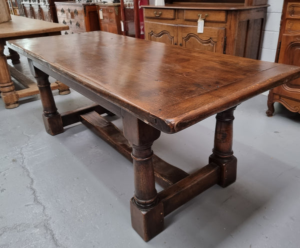 Lovely vintage French dark Oak pedestal base Farmhouse table. It can comfortable sit eight and it is in good original condition.