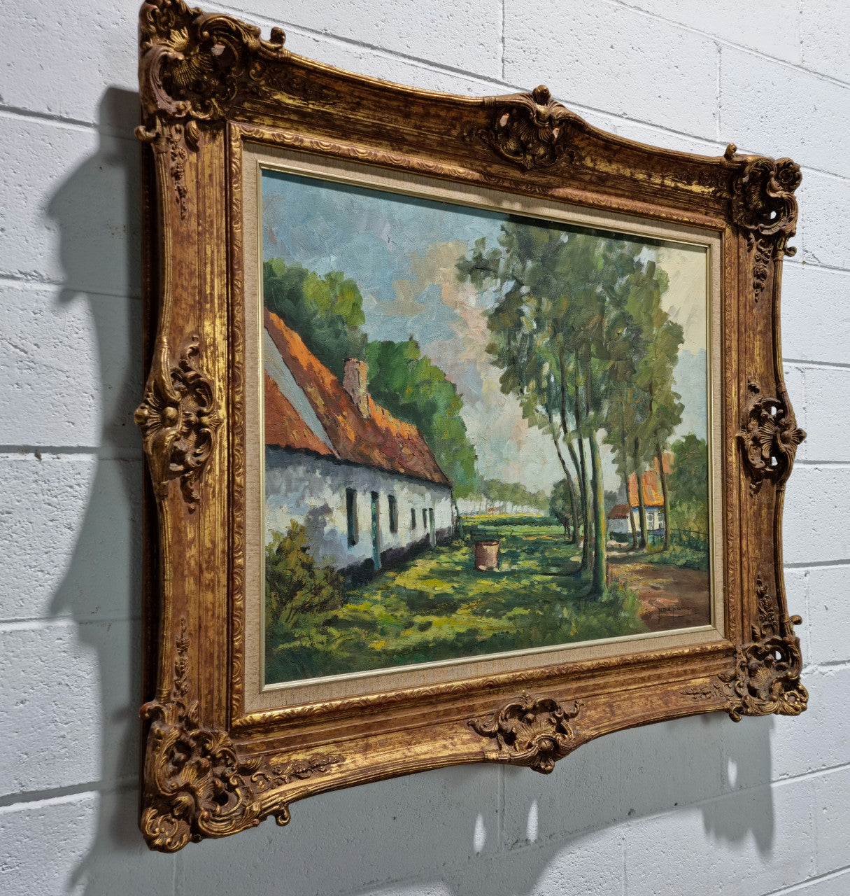 French oil on canvas impressionist painting in a beautiful decorative frame and in good original condition.