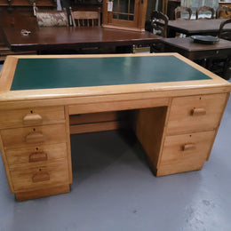 Parliament house desk made from Queensland maple. Desk has room numbers stamped to front. It's in good original condition. Purchased from a sale in old Parliament House in the late 1980's.