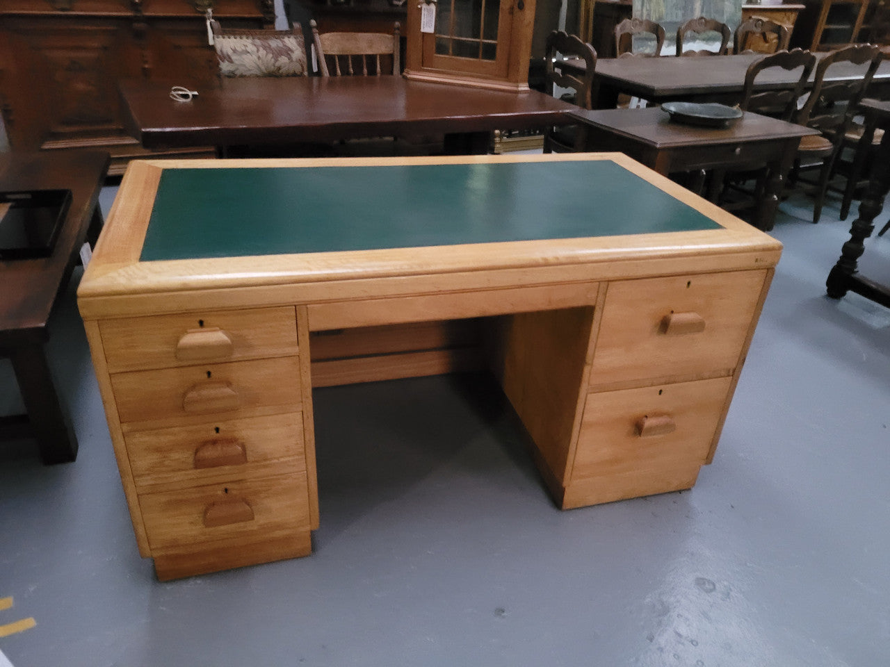 Parliament house desk made from Queensland maple. Desk has room numbers stamped to front. It's in good original condition. Purchased from a sale in old Parliament House in the late 1980's.