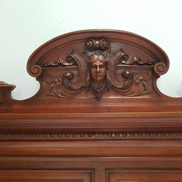 Grand French Henry II style Mahogany queen size bed. Very detailed carvings and comes with custom made bed slats, simply just put your mattress on top. In very good condition.