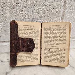 Very small antique leather bound Key of Heaven Manual of Prayer Book printed by M H Gill & Son Dublin. Condition commensurate with age.