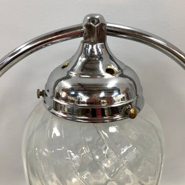 Decorative Art Deco chrome and glass table lamp that has been rewired and is in good original condition.
