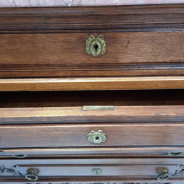 Lovely Antique French Walnut Renaissance style chest of four drawers with decorative handles and beautifully carved. There is a lovely marble top and in good original detailed condition.