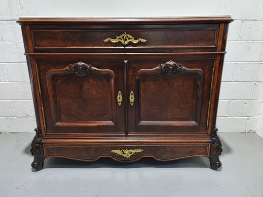 Stunning Rosewood Marble Topped Secretaire with two cupboards. Cupboards open to three fitted drawers and an additional secret drawer beneath the cupboard. All sitting on lovely carved legs and decorated with ormolu mounts. Circa: 1860. In good original detailed condition.