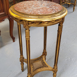 Late 19th Century French Louis XVI style round marble top side table/ lamp table. It is in good original detailed condition and has been sourced from France.