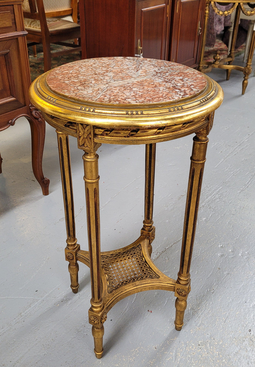 Late 19th Century French Louis XVI style round marble top side table/ lamp table. It is in good original detailed condition and has been sourced from France.