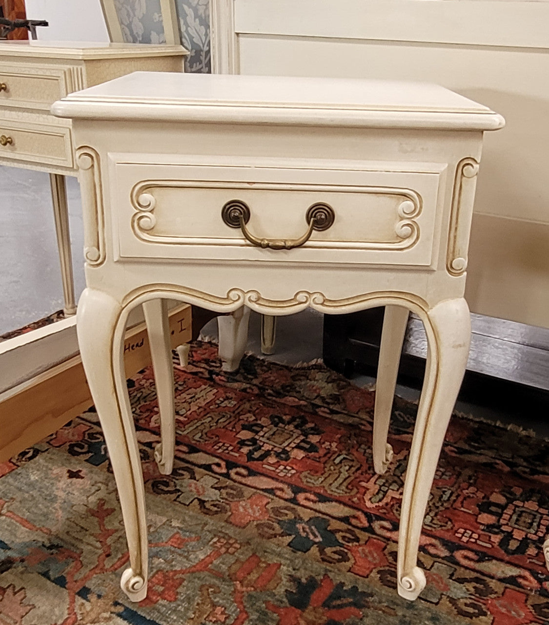 Pair French Vintage Louis XV style soft Ivory single drawer bedside tables. They have been sourced from France and are in good original condition.
