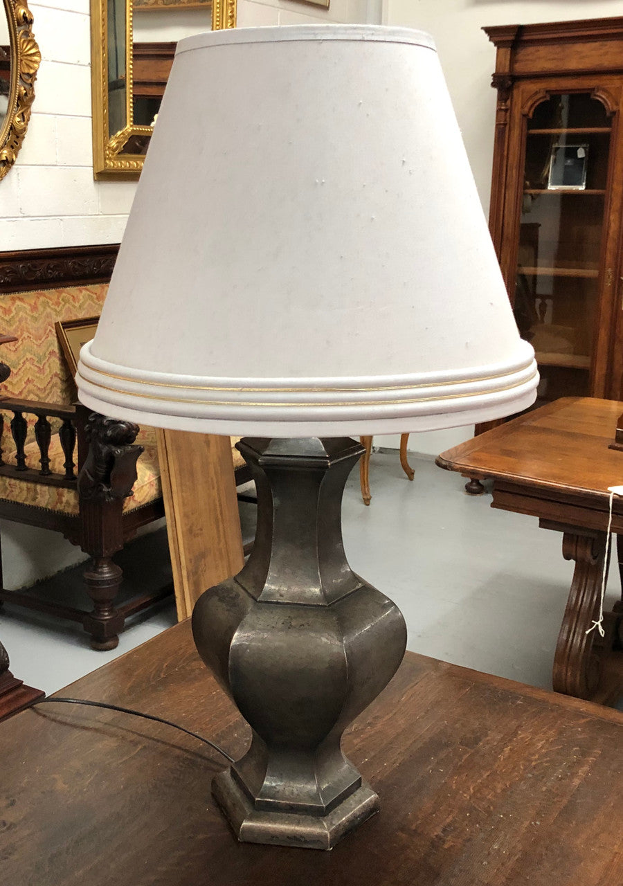 Beautiful pair of 19th Century pewter covered Bronze table lamps with light grey shades .They have been rewired and in good working order.