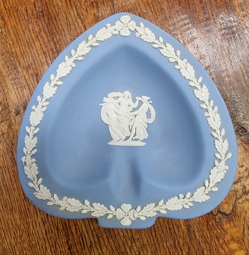 Delicate Spade shape Blue/White Wedgwood Jasper Ware small bowl decorated with Grecian ladies. In good condition please view photos as they help form part of the description.