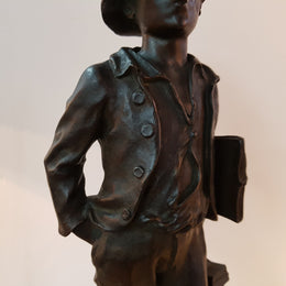 Fabulous French bronze statue of a school boy from the early 20th century. Signed by Marcel Debut ( 1865-1933) and its titled School Boy.