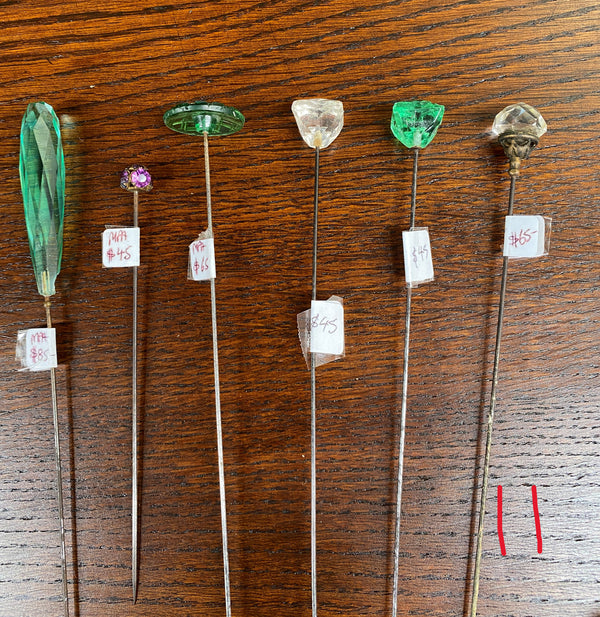 We stock a range of assorted Vintage/Antique hatpins which start from $6. Please view photos to see our current range. You are able to purchase our hat pins by either emailing us or calling us to confirm availability and prices.