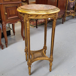 Late 19th Century French Louis XVI style round marble top side table/ lamp table. It is in good original detailed condition and has been sourced from France.