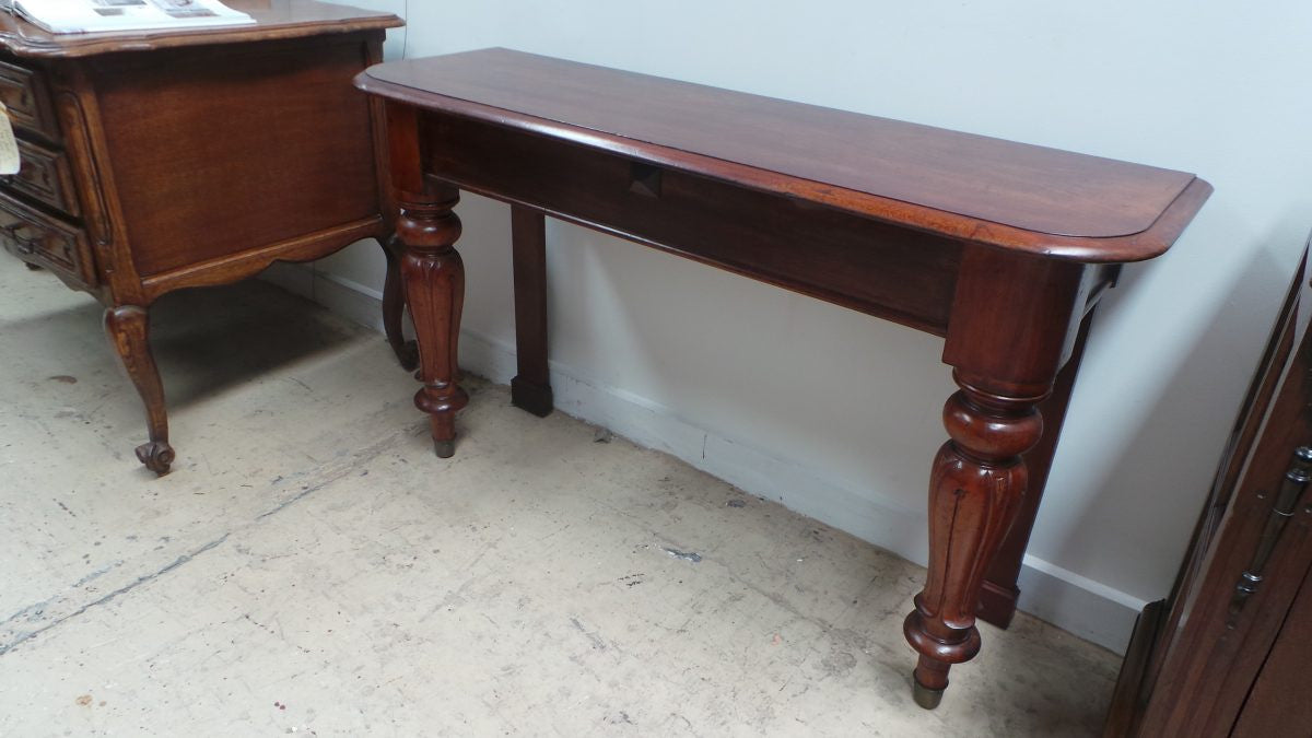A Matching Pair Antique Console Tables