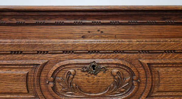 Early 19th Century French Oak chest of three drawers. It has beautiful handles and carvings. It is in good original detailed condition.