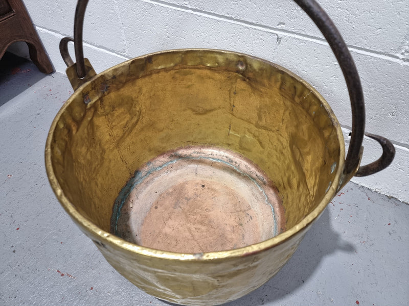 Antique French brass firewood handled bucket. In good original detailed condition.