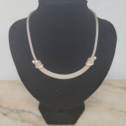 Beautiful Italian sterling silver woven double heart necklace. In good condition.
