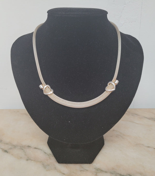 Beautiful Italian sterling silver woven double heart necklace. In good condition.